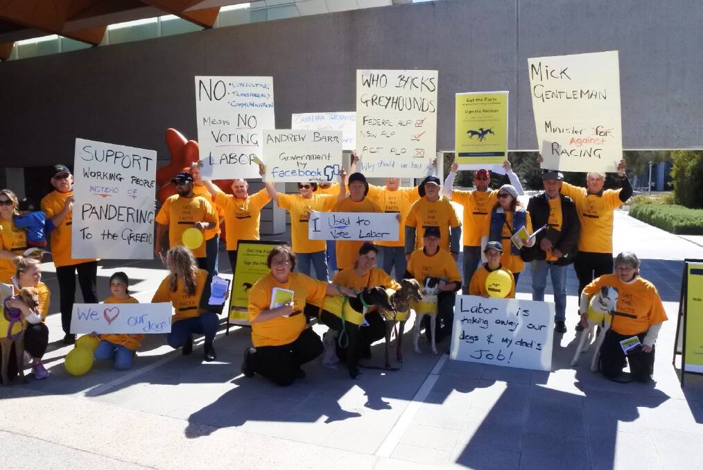 The Canberra Greyhound Racing Club organised a protest outside the Labor launch attacking the Barr government's decision to shut the ACT industry.  Photo: Matthew Raggatt