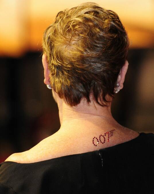 British actor Judi Dench with a (temporary) 007 tattoo at the premiere of the James Bond film Quantum of Solace in 2008. Photo: Dylan Martinez