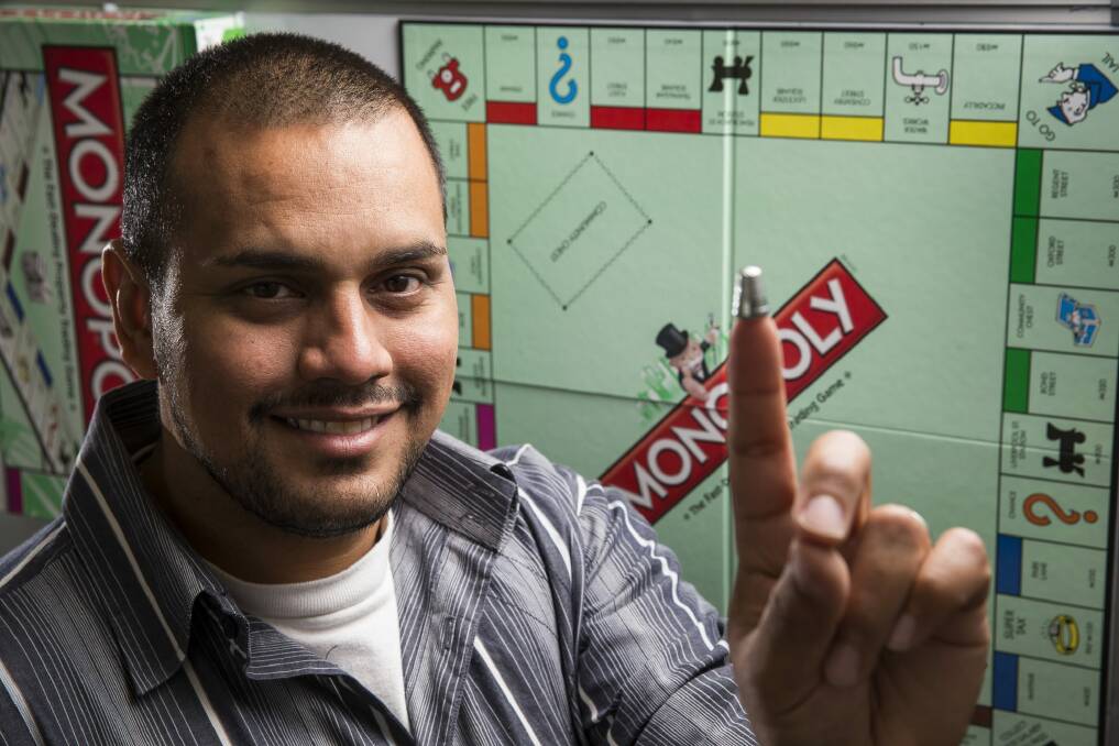 Gerard Abideen, the ACT Monopoly champion, has welcomed the news the capital could have its own Canberra-centric Monopoly board within two years.  Photo: Matt Bedford