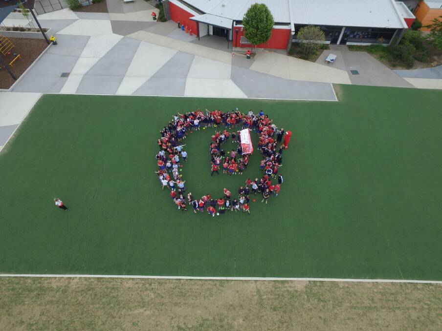 Students at Mother Teresa Primary School in Harrison form a 'D' on Day for Daniel. Photo: Supplied