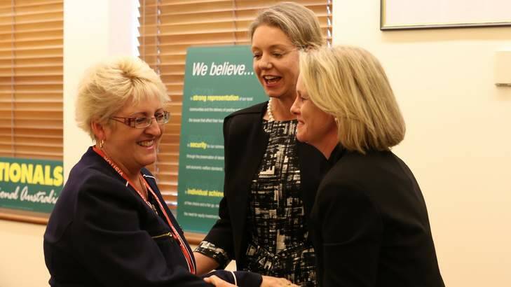 New LNP member for Capricornia, Michelle Landry, is congratulated by Senators Bridget McKenzie and Fiona Nash at the National Party meeting in Canberra on Friday. Photo: Andrew Meares