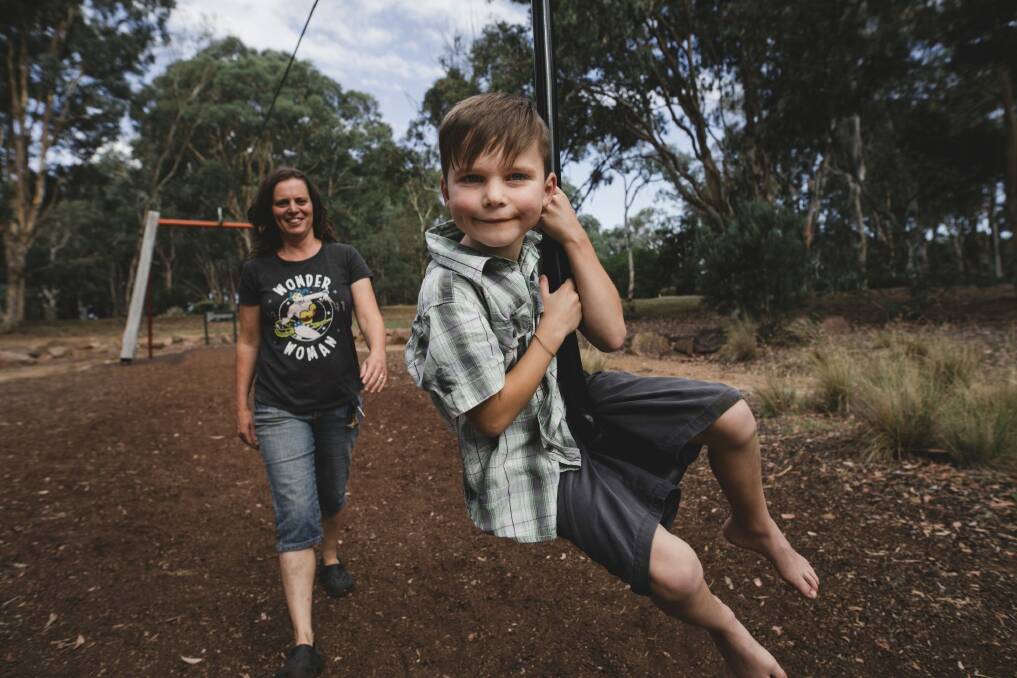 Roslyn Pengilly with her son Timothy, 7. Timothy has sensory processing issues and possibly autism spectrum disorder, and his mother Roslyn is worried that he will be forced to attend Melba Copland after year 6. Photo: Jamila Toderas