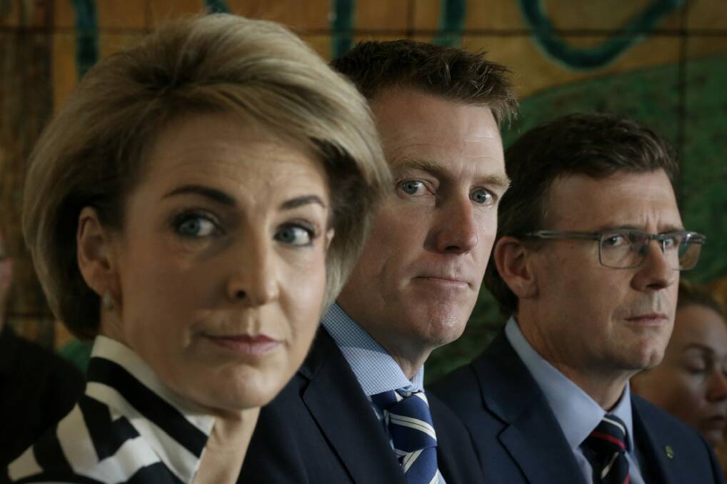 Minister for Women Michaelia Cash, with Social Services Minister Christian Porter and Human Services Minister Alan Tudge. Photo: Andrew Meares