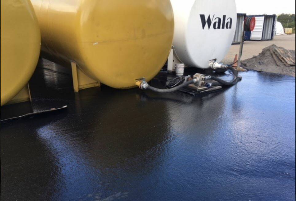 The leak from an explosives storage area at New Chum where a tank bears the brand Wala. Photo: Supplied