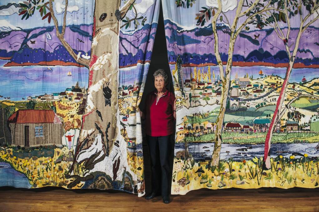 Pam Brayshaw with the Adaminaby Stage Curtain, which will be back on display for tourists. Photo: Rohan Thomson