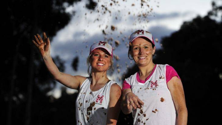 From left, Rochelle Riley of Casey and Sharon Moloney of O'Connor preparing for Miss Muddy, an obstacle course fitness event that will be held at Exhibition Park in Canberra on October 19. Photo: Melissa Adams