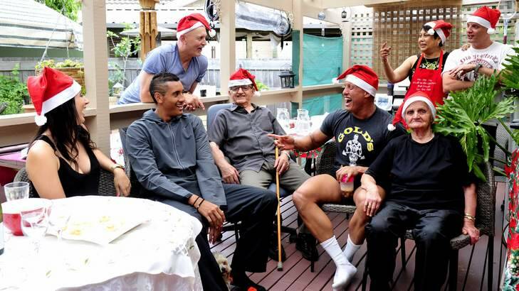 Canberra tennis star Nick Kyrgios spends christmas at home with his family in Watson. L-R The Kyrgios family: sister Hali, Nick,  dad George, grandfather,  Christos, brother Christos, mum Nill, godfather Nick and grandmother Litsa. Photo: Melissa Adams