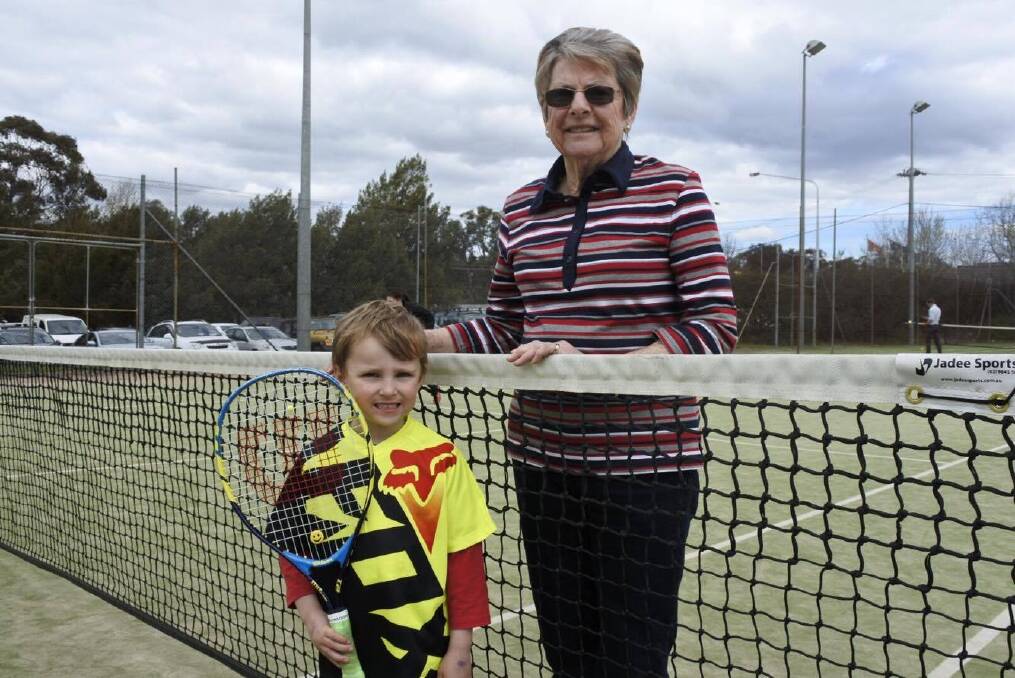 Dorothy Simm, 77, and Zachary Thomas, 4, at the Weston Creek Tennis Club's Tennis Carnivale. Photo: Caden Helmers