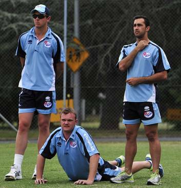 NSW bowlers Josh Hazlewood, Doug Bollinger and Josh Lalor during a training session at Manuka Oval. Photo: Jay Cronan