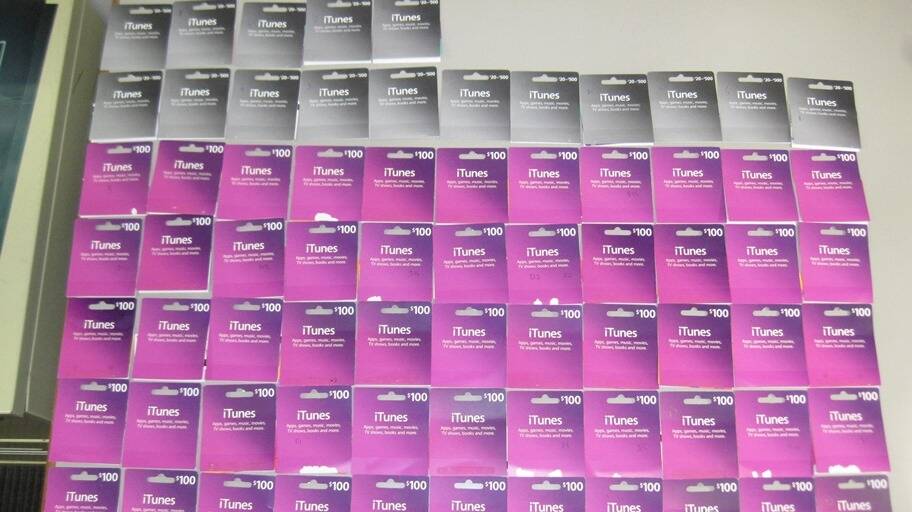 The iTunes gift card backings kept by the Canberra woman defrauded by a telephone scammer. Photo: Supplied
