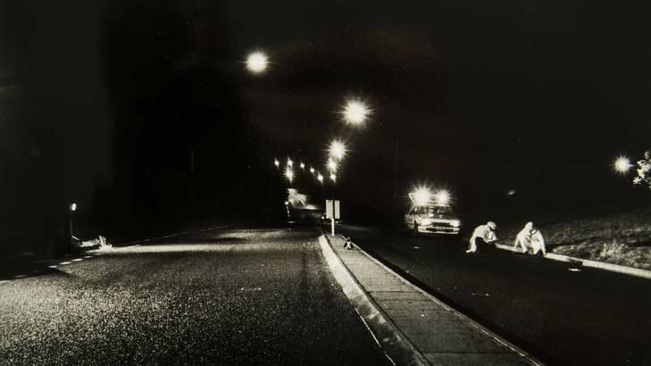 A photograph showing a body on the road, from the coronial inquest into the death of Troy Forsyth, who was killed in a hit and run in Kent Street, Deakin, on March 1, 1987. Photo: Rohan Thomson