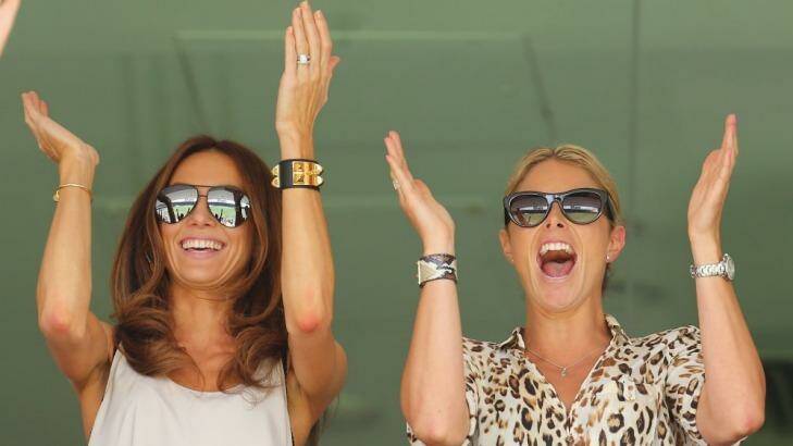 Kyly Clarke and fellow cricket WAG Candice Falzon cheer on their partners during the Ashes. Photo: Getty Images