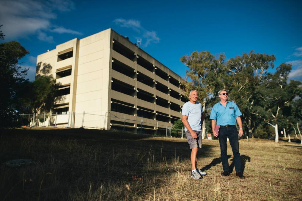 Graham Crompton and Shane West, at the former CSIRO headquarters at Mount Ainslie. The pair are campaigning for the buildings to be saved from a planned quick demolition. Photo: Rohan Thomson