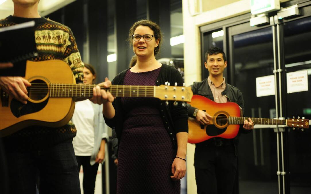 Songs of joy: Olivia Swift leading CHOIR Canberra at the ANU School of Music. Photo: Melissa Adams