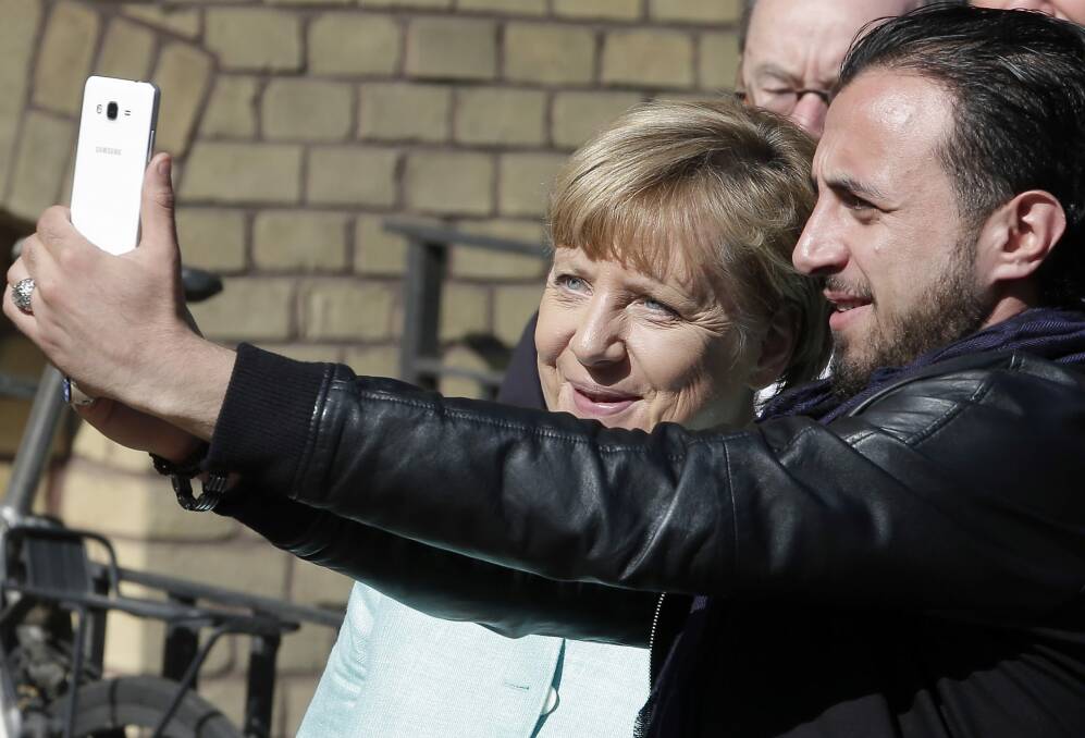 Some world leaders, particularly Angela Merkel in Germany, have been extraordinarily generous in offering help. Photo: AP