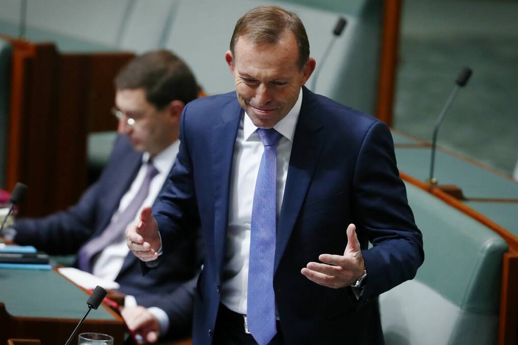 Mr Abbott declared "we need to make Australia work again" as he sent Mr Turnbull an ominous message. Photo: Alex Ellinghausen
