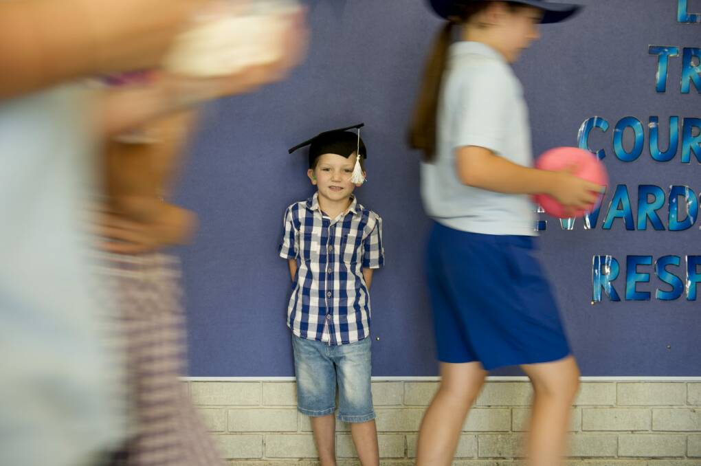 Five-year-old Nate Korbl, who has mild to moderate hearing loss and wears a hearing aid in each ear, is off to big school next year at St John the Apostle Primary School in Florey Photo: Jay Cronan
