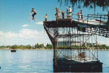 Teenagers experience the thrill of the Birdman Rally launch platform on Lake Burley Griffin after competition finish in 1987. Photo: John Moulis