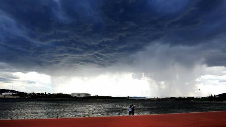A storm brews over Lake Burley Griffin on Sunday afternoon. Photo: Melissa Adams
