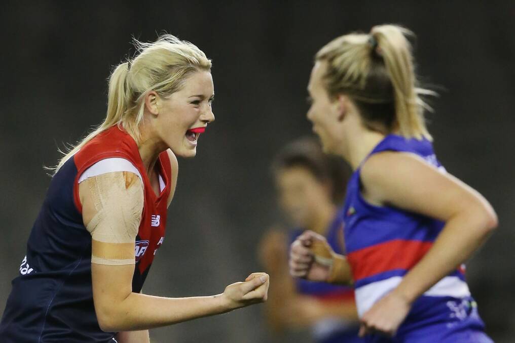 Tayla Harris of the Demons celebrates a goal during a women's AFL exhibition match against the Western Bulldogs at Etihad Stadium on August 16. Photo: Getty Images