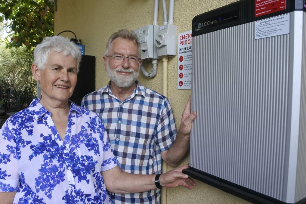 Lainie and David Shorthouse with their solar battery system. Photo: Georgina Connery