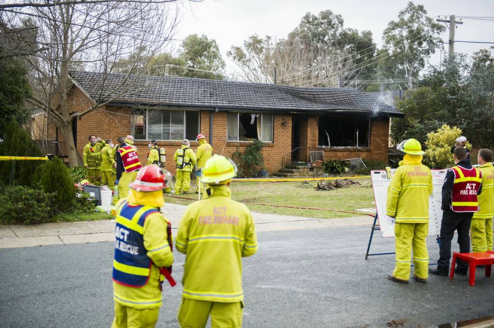 ACT Fire and Rescue after extinguishing a fire at a home on Woralul St in Waramanga. Photo: Rohan Thomson