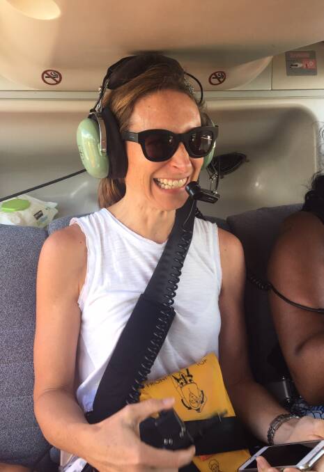 Australian National University associate professor Meghan Miller flies over Hawaii's Kilauea volcano in a helicopter. Photo: Supplied