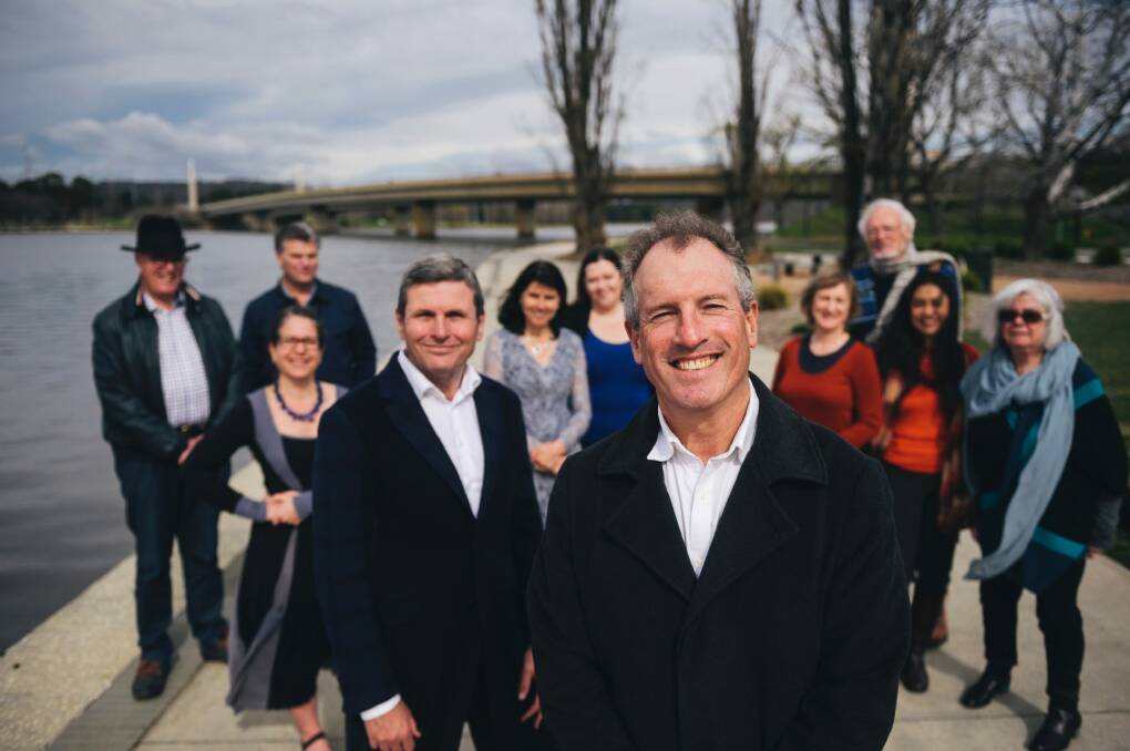 ACT authors of the wire Chis Uhlmann and Steve Lewis with other local Canberra authors ahead of the inaugural Canberra Writers Festival. Photo: Rohan Thomson