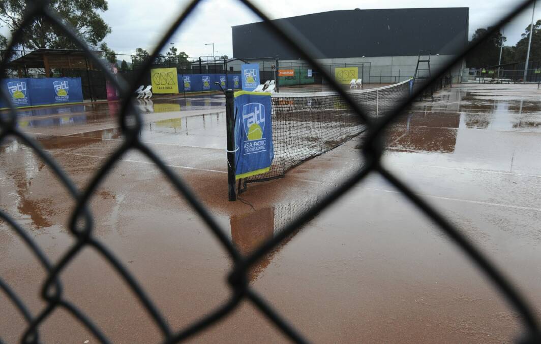 Tennis courts were washed out after the Saturday deluge. Photo: Graham Tidy