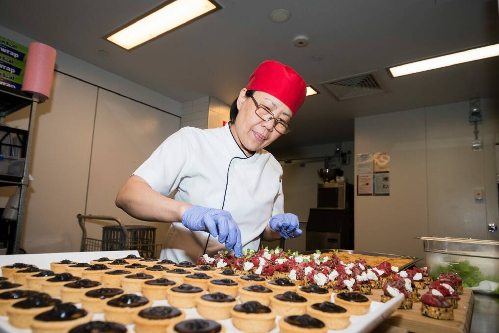 Chef Christine Hearn preparing canapes for a function at the National Portrait Gallery. Photo: Dion Georgopoulos
