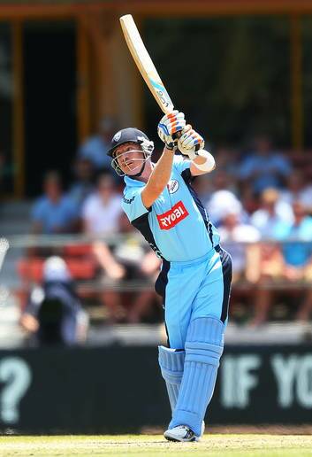NSW batsman Brad Haddin hits one over the infield during Sunday's Ryobi Cup clash with Victoria. Photo: Getty Images