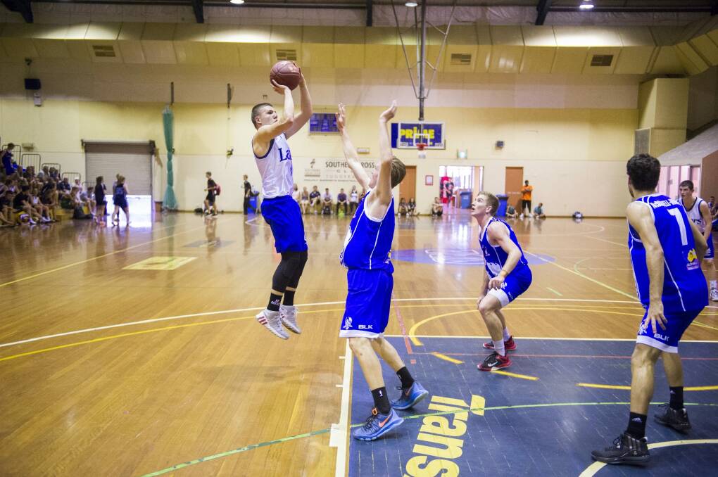 Lake Ginninderra guard Dejan Vasiljevic takes a shot on his way to a game-high 45 points in the final of the Australian Schools Championship at the Tuggeranong Southern Cross Stadium on Friday. Photo: Rohan Thomson