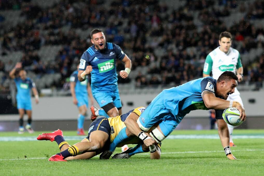 Blues flanker Jerome Kaino scores a try against the Brumbies. Photo: Getty Images