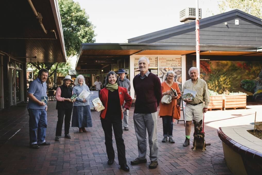 It's been one year since the ACAT tribunal retired to consider their appeal against the redevelopment of a Dickson car park into a Coles supermarket and apartment complex. Front, Jane Goffman and Ron Brent. Behind, Denis O'Brien, Jacqui Pinkava, Rosemary Urquhart, Paul Costagan, Robin d'Arcy, and John Carroll.  Photo: Jamila Toderas