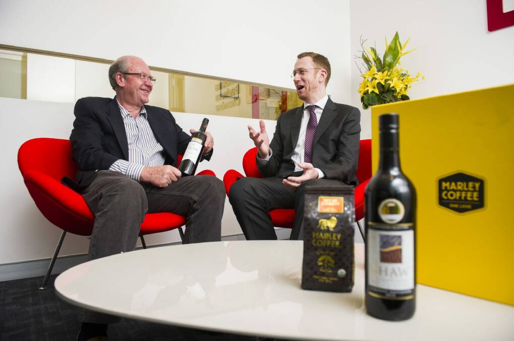 Director of Shaw Vineyard Estate, Graeme Shaw, and the Australian Trade Commission's Brett Cooper with Shaw wine and Marley Coffee. 
 Photo: Rohan Thomson