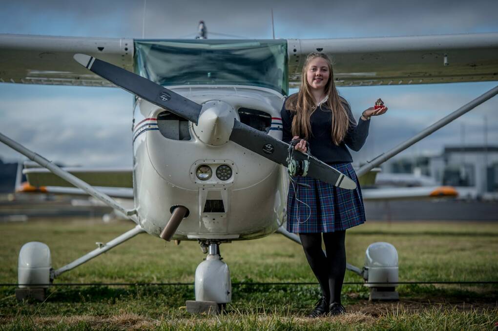 Year 10 Merici College student Jade Esler has funded her flying lessons through cupcake sales. Photo: Karleen Minney