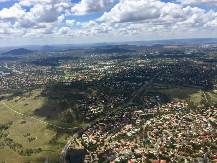 An aerial view of Canberra from the specialist intelligence-gathering helicopter. Photo: Blake Foden