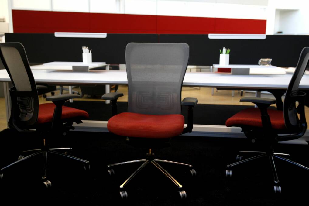 Hot desking is a trend in workplaces but is despised by some private sector staff. Photo: Louise Kennerley