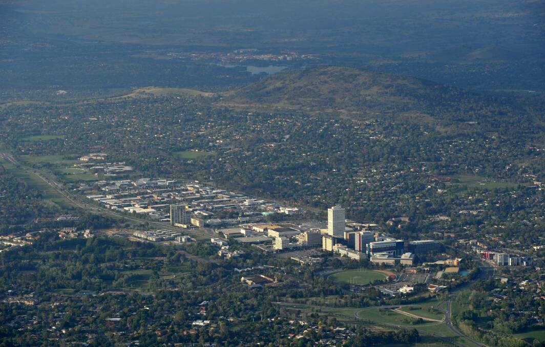 At least 2100 public servants are expected to leave Woden, hurting the local economy. Photo: Graham Tidy