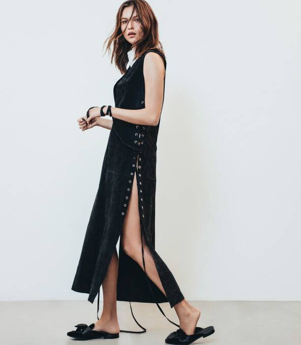 Albus Lumen "Lolita Long Lace Up" dress ($990) and "Fringe" scarf ($150). Pair with early to ear footwear like Sandro Paris "Rita" slides ($520). Photo: Jesse-Leigh Elford