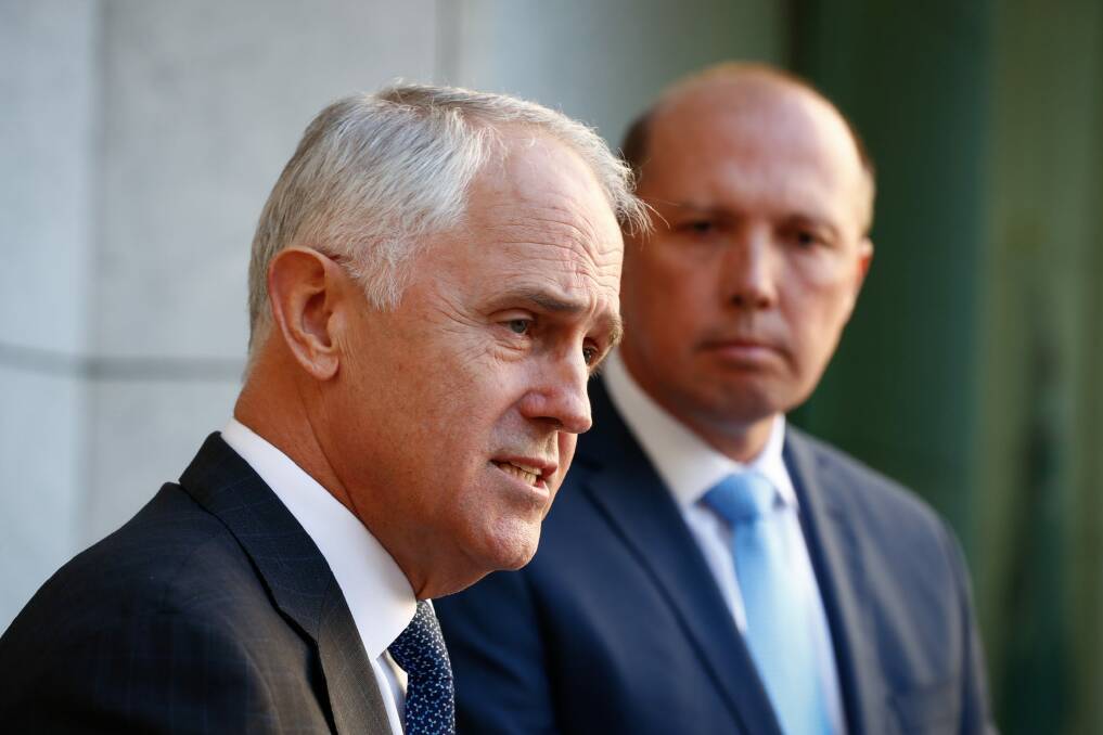 Prime Minister Malcolm Turnbull and Immigration Minister Peter Dutton unveil details of the 457 visa shake-up in April. Photo: Alex Ellinghausen