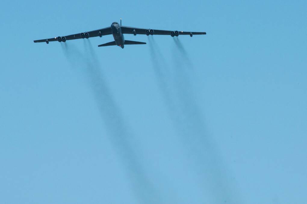 Vietnam era USAF B-52 Bombers fly over Canberra to commemorate the 50th anniversary of the Battle of Long Tan. Photo: Rohan Thomson
