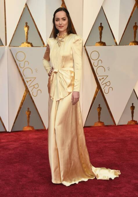 Dakota Johnson in need of a good iron at the Oscars. Photo: AP