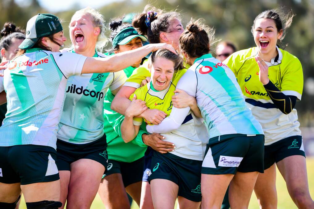 The Wallaroos celebrate Georgia Cormick nailing the crossbar challenge. Photo: Stuart Walmsley/rugby.com.au