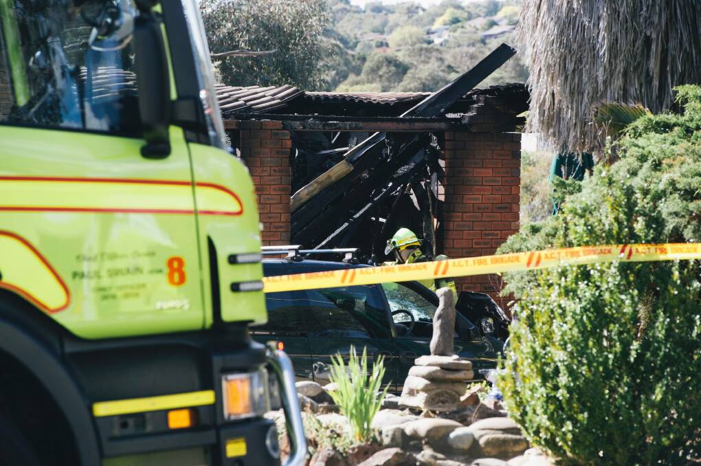 Firefighters at the house fire on Derry St in Monash. Photo: Rohan Thomson
