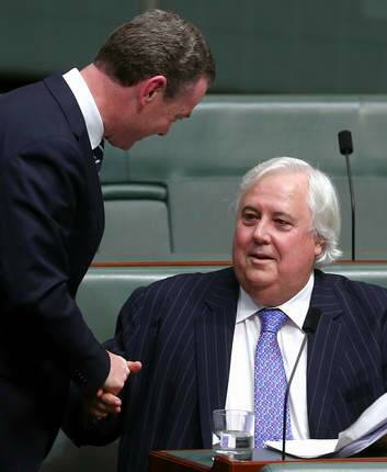 Palmer United Party leader Clive Palmer shakes hands with leader of the house Christopher Pyne after speaking on the carbon tax in the House of Representatives on Monday. Photo: Alex Ellinghausen