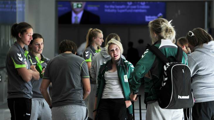 Canberra United players wait in departures at Canberra airport before heading to Japan. Photo: Jay Cronan