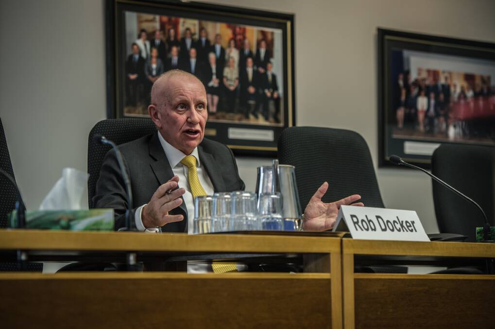 Tradies chief executive Rob Docker giving evidence in July at an ACT parliamentary inquiry into the Dickson land swap: Says the debate has turned into political point-scoring at the club's expense. Photo: Karleen Minney