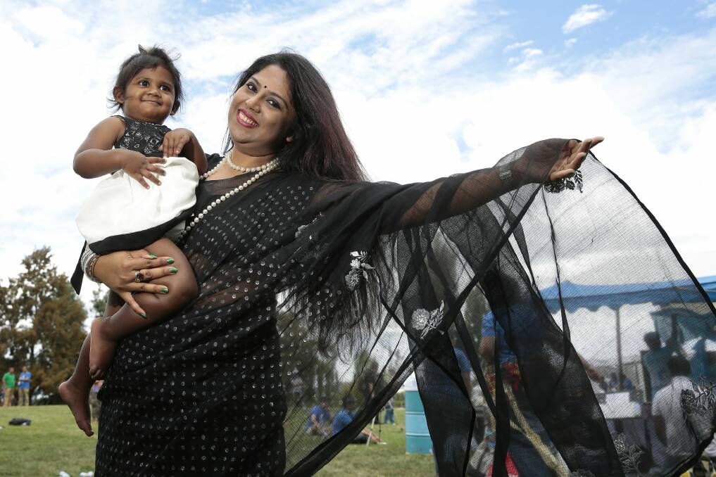 Two year old Aditri Sarkar with mother Priyanka Biswas of Gungahlin. Photo: Jeffrey Chan