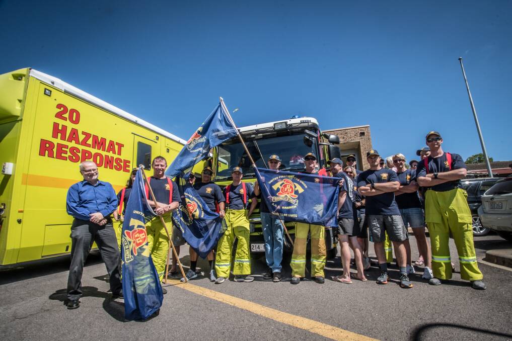 United Firefighters Union ACT branch secretary Greg McConville, left, with firefighters outside Fyshwick Fire Station on Thursday morning. Photo: Karleen Minney
